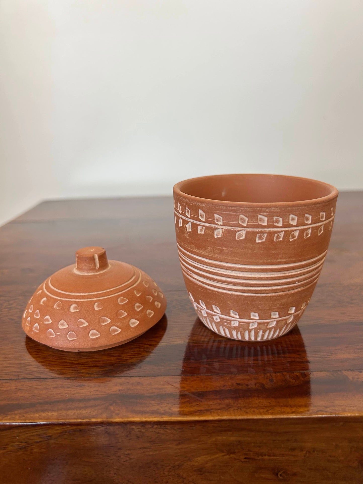 elongated terracotta pot