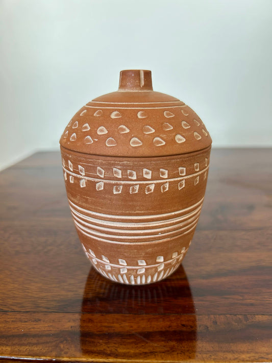 elongated terracotta pot